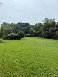 Photo of 4984 Ambs Road, Mehlville, MO 63128 (MLS # 26052543)