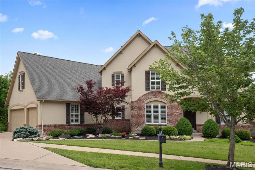 Welcome to this exquisite 1.5-story home ideally located in the heart of Chesterfield. From the moment you enter, you're welcomed by a formal dining room and a private study—perfect for remote work or quiet reading. The spacious great room impresses with a bay window, arched doorways, and a see-through fireplace that connects to the inviting hearth room, creating a seamless blend of elegance and comfort. The vaulted kitchen is both functional and stylish, featuring a large center island, granite countertops, stainless steel appliances, a gas cooktop, double ovens, and an adjoining breakfast room that opens to a serene screened-in porch—ideal for morning coffee or evening relaxation. The hearth room, with its warm gas fireplace and custom built-ins, offers a cozy space for gathering. The main-level primary suite provides a private retreat, complete with a luxurious en suite bath showcasing double vanities, a soaking tub, walk-in tile shower, and a spacious walk-in closet. Upstairs, you'll find a generous loft area and three additional bedrooms—each with its own private full bath—offering plenty of space for family or guests. The finished walk-out lower level is designed for fun and functionality, featuring a large rec room, game room, flex space, and a convenient half bath. Step outside to enjoy the beautiful patio, fire pit, and fully fenced yard—perfect for outdoor entertaining. A finished 3-car garage completes this exceptional home that combines luxury, space, and comfort!