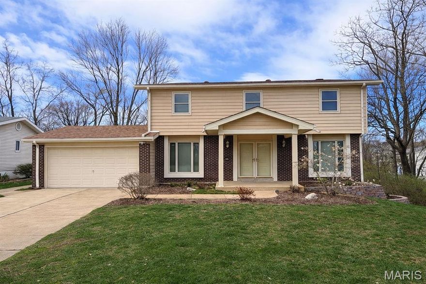 Welcome to this spacious 4 bedroom, 2.5 bath home located in a peaceful cul-de-sac. Large picture windows fill the living room with natural light creating a warm and inviting atmosphere. A separate dining room on the opposite side of the entry hall provides a wonderful area for hosting gatherings. The eat in kitchen features a decorative tile backsplash and a pantry, and it is adjacent to the family room. The family room has a fireplace and sliding doors opening the deck. A half bath completes the main level. The upper level features the primary suite with a private bath and a walk in closet. 3 additional bedrooms and 2 have walk in closets and a second bath on the upper level. Your living area extends to the finished lower level, which features an expansive family room with white walls and neutral carpet creating a blank canvas for you to create your own unique space. Enjoy summertime fun on the oversized property that backs up to common ground. The large deck overlooks the tree-lined backyard, which includes a separate patio—the perfect spot for barbecues with plenty of room for gardening and play. Conveniently located close to Olive Blvd., Hwy 40, Faust Park, shopping and great restaurants.