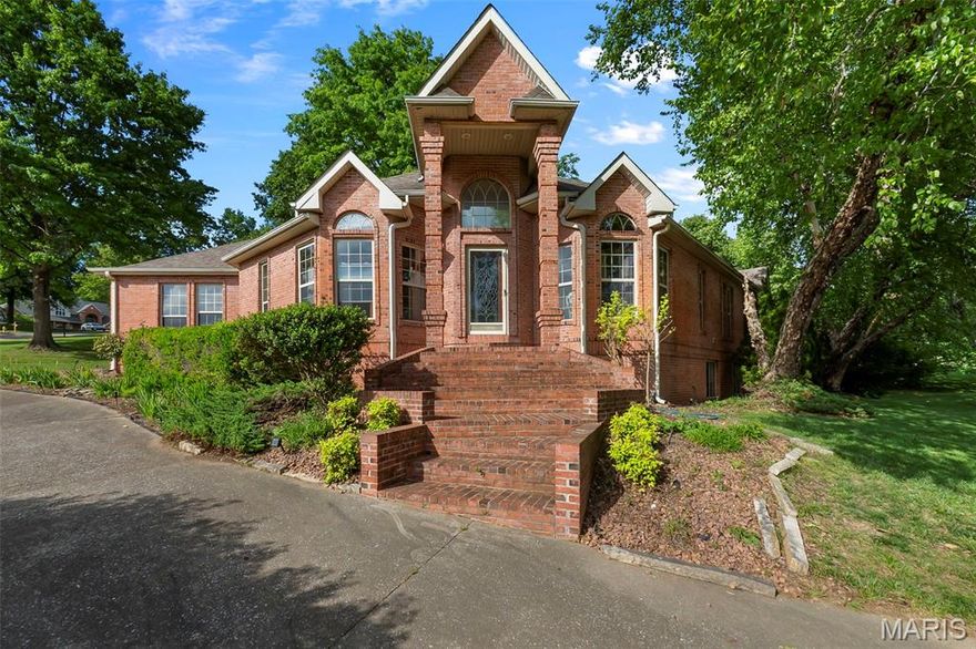 Welcome to 2204 Crown Point in Cape Girardeau - offering over 2800 finished square feet with room to grow! With over 1900 square feet on the main level, this all brick home delivers spacious, comfortable living from the moment you walk in. The main level features three bedrooms all with vaulted ceilings, including a generous primary suite complete with soaking tub, separate shower, dual granite vanity, and his-and-hers walk-in closets. The second bedroom offers its own attached full bath, while the third bedroom sits conveniently next to a full hall bath -perfect for guests to access as well. The heart of the home showcases a large open-concept living room and formal dining area with a vaulted ceiling, cozy gas fireplace, and numerous windows creating a warm and inviting space flooded with natural light. The kitchen offers granite countertops, stainless steel appliances, and an eat-in area that flows into a spacious sunroom - ideal for relaxing or entertaining year-round. You’ll also appreciate the convenience of main level laundry. The partially finished walkout basement expands your living space with two additional bedrooms, a full bath, and a large family room, ample storage and the opportunity to easily finish even more square footage to fit your needs, plus added peace of mind with a newer two year old HVAC system. Situated on a desirable corner lot in a quiet neighborhood, this home offers both privacy and space to enjoy the outdoors, with a sunroom and patio perfect for relaxing or entertaining. Combining all-brick construction with generous square footage and a flexible layout, don’t miss your chance to make this exceptional home yours!