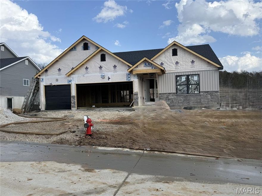 Spec Home TO BE BUILT - 3 bed / 2 bath ranch w/3 car garage. Lots of quality STANDARD FEATURES such as Architectural Shingles, Stainless Steel Appliances, 6lb Rebond Padding, Painted trim, Covered Facia and Soffits, Grids in Front Windows, Panel Door options to choose from, Sodded entire yards where disturbed, Boundary Survey by builder, plus much more.  Additional features include, vertical siding in front, bay window in master bedroom, kitchen features 42" cabinets, granite & pantry cabinet, upgraded flooring in all main areas including both bathrooms. Cathedral ceilings @ great room, kitchen and breakfast room. All black windows, sliding door, gutters, soffit, fascia, plumbing fixtures & garage doors. Master bath with tile around tub, double bowl sink, and pocket door. Rough in bath in lower level.