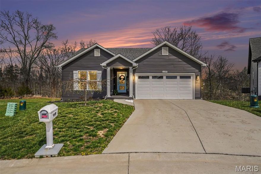 This well-maintained, 2-year-old ranch home in the desired Providence subdivision features an open-concept design with modern finishes and a finished 2-car garage.  A vaulted ceiling and luxury vinyl flooring complete the spacious living room.  The updated kitchen has a large island with sink & dishwasher, stylish backsplash, ample cabinet and counter space also provides stainless steel appliances including the refrigerator.  The primary bedroom suite has carpeting, an exceptionally large walk-in closet (10’-10” x 20’-9”) and a full bathroom with a double bowl vanity!  The 3rd bedroom is currently designed to function as additional closet space in the hallway and primary bedroom with studs in place for an easy conversion back to a standard bedroom.  Home is equipped with a main floor laundry room with a large pantry! The covered deck with a ceiling fan/light is right off the kitchen area and overlooks a peaceful wooded common ground view. The full walkout basement is equipped with a sump pump and is waiting for your finishing touches. The home is situated at the end of a cul-de-sac and the community offers a pool, clubhouse, basketball court and playground.  The home has convenient access to schools, shopping and a major interstate.  All window treatments and refrigerator are included and the home offers a “like-new” alternative to building. Why build and wait for a new home when you can have a very young and upgraded nicely home?  The siding selection was even an upgrade!  It already has great curb appeal and I believe Mrs. Clean lives here!
