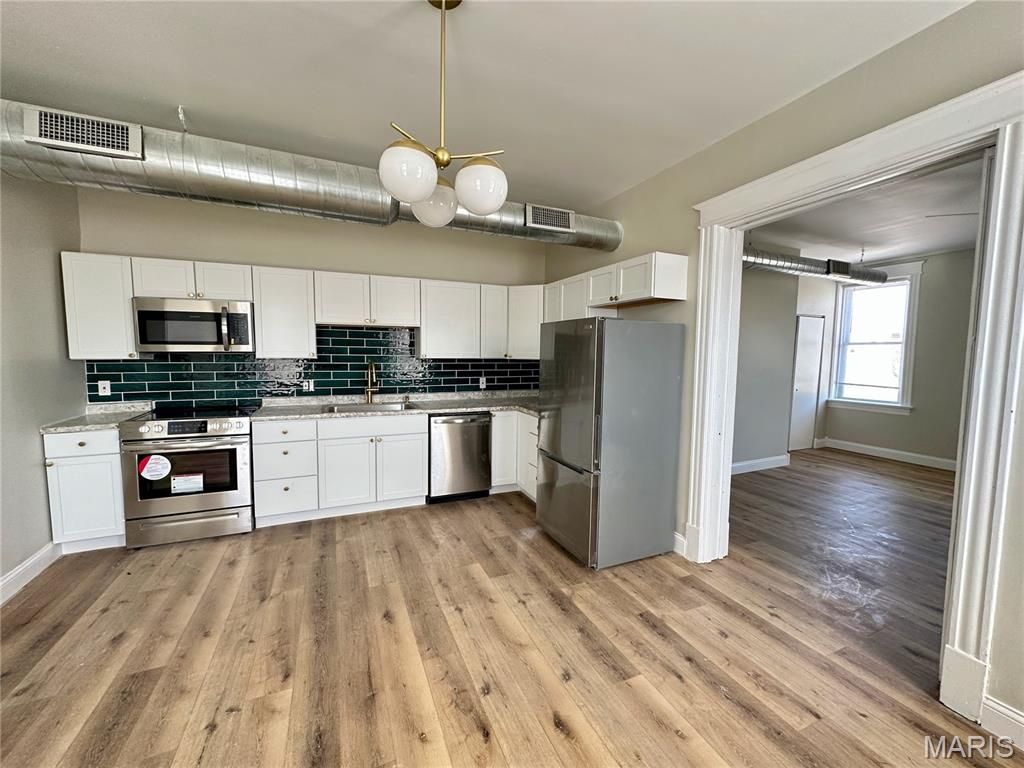 Photo of 3148 Winnebago Street, St Louis, MO 63118 (MLS # 26026482)