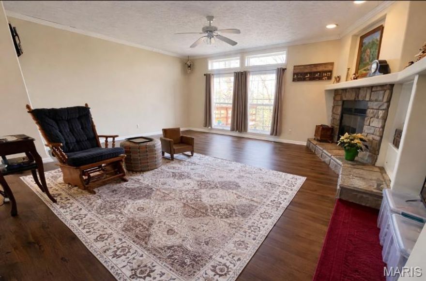 Very attractive 1,800 sq. ft. modular home, with metal roof, built in 2006. This 3 bedroom, 2 bath home has a gas log fireplace, recessed lighting,large rooms, new carpeting.Primary bedroom has a garden tub and a walk-in shower, along with a walk-in closet. tilt out windows, CH/A, arched doorways, very nice kitchen,  oven/range/ dishwasher/microwave, refrigerator,pantry,with island. New 1,000 gal. septic,Outside there is a deck to enjoy your coffee on, and a  storage shed. All sitting on 1.1 acres m/l and on a paved highway. Call to view this very nice home.