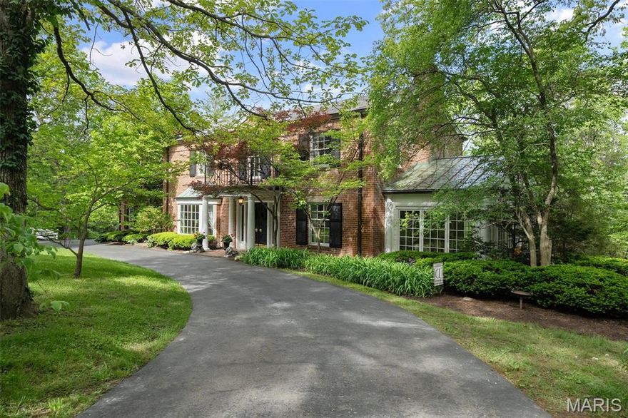 Price Reduced! Don't Wait!! Classic Colonial elegance meets prime Ladue living on nearly 2 beautiful, tree-lined acres along one of the area’s most desirable streets. Complete privacy year-round on one of the most lovely lots in Ladue. The 4-bed brick home features a traditional layout w/timeless character, inc Pella windows, copper gutters & rich architectural details. The main floor offers a flex bedroom or office w/full bath, light-filled garden room & access to a tranquil patio—ideal for everyday living or entertaining. You'll also find a formal dining room and a spacious, elegant living room. Upstairs, the primary suite offers a peaceful escape with full bath and walk-in closet. Two more generous bedrooms complete the second floor. A circle drive enhances both convenience & curb appeal. This is a rare opportunity to own a classic home in an estate-like setting.
