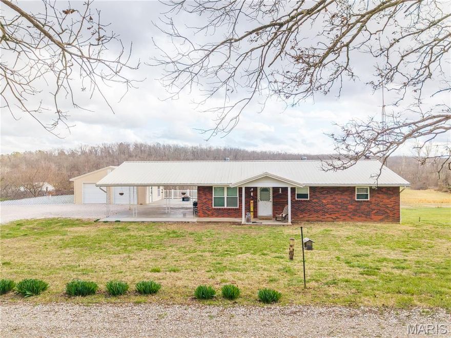 Have you been looking for the perfect mini farm? This 3 bedroom, 2 bathroom home sits on a beautifully fenced and cross fenced 8.5 acres, making it ready for your livestock immediately. This all-brick ranch home's interior recently underwent a complete renovation that you will fall in love with the moment you step inside. Some additional features include a detached shop, a walk-out basement, and a full concrete safe room under the carport. This property gives your family room to enjoy the outdoors, and offers true country living.