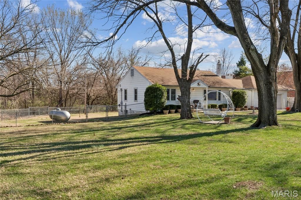 Photo of 2275 Charbonier Road, Florissant, MO 63031 (MLS # 26016592)