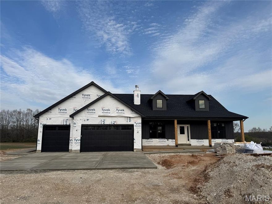 Move into your brand new home on acreage this spring. Welcome to country living in Lincoln Counties newest subdivision Hickory Heits. The Sierra model custom ranch home in extreme southern Lincoln county with April estimated completion. Your 1765 sq ft, 3 bedroom, 2 bath new home will impress your guests with the top notch finishes but more importantly it will be a great place for your family. The farmhouse style front of the home includes stone, maintenance free vertical vinyl and an enormous covered front porch to enjoy the evenings on. As soon as you enter the home you will notice the attention to detail, 9 ft main floor, wood burning fireplace, and the openness in the great room, kitchen, and dining room. The kitchen has soft close drawers and doors, quartz countertops, subway tile backsplash, and the full stainless steel appliance package. Just past the dining room is a sliding door that leads to a covered patio that overlooks the 3 acre lot and the tree line behind the house. The divided floor plan has the master bedroom on one end and bedrooms 2 and 3 on the other end. All bedrooms are a comfortable size with plenty of natural light. The primary bedroom suite is complete with the large ceramic tile walk in shower (no glass shower door to clean) and double vanity in the master bathroom that all leads to the large walk in closet. Plan for the future with the full 9 ft pour egress basement that includes a bathroom rough in and plenty of options for finishing it down the road. Enjoy parking your large vehicles and toys inside the oversized 28'x32' three car insulated garage complete with garage door openers, keypad for easy entry, service door and plenty of natural light from the windows in both garage doors. Don't miss out on this high quality home in a great neighborhood. All finished home interior pictures are of previously built similar home. Progress pictures will be uploaded throughout construction. Don't miss out of moving this spring just in time to enjoy the great summer evenings. Builder has been told by Lincoln County that Patton Road will be paved this year. Hickory Heits Court will be hard surfaced after all 10 homes are complete.