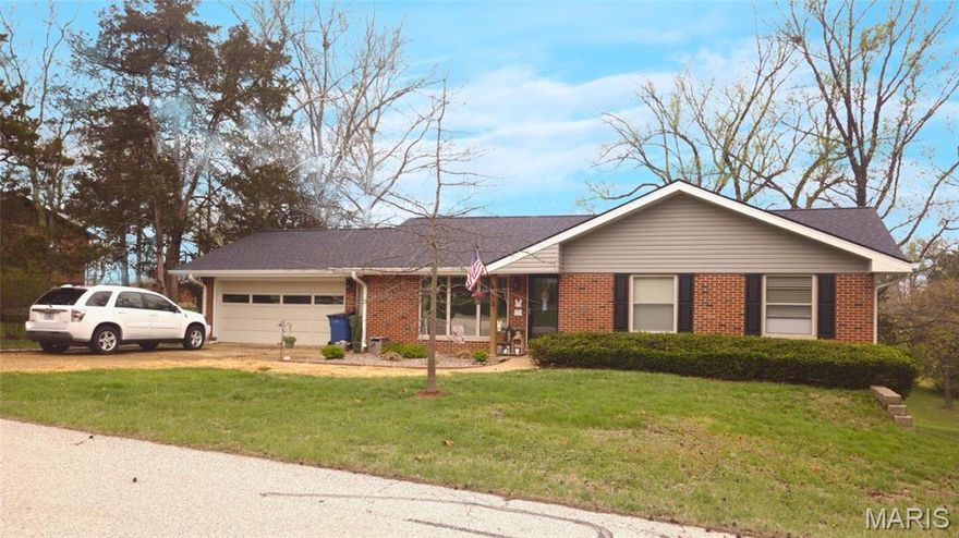 This beautiful, brick ranch has so much charm, you may never want to leave! Step inside to the spacious living room that makes you feel at home right away. The large picture window and new front door let in tons of natural light. The beautifully, updated kitchen and dining area offers plenty of storage with newer range and dishwasher. The main level offers 3 bedrooms and 2 full baths. Head downstairs to find the fourth bedroom and newly finished basement with new boiler and tankless water heater. This great layout offers plenty of options with an additional half bath. Out back you'll love enjoying the new, covered patio with a great view of the neighbor's pond. This wonderful home is located in the highly sought after Hillsboro School District and will be gone in a flash, so schedule your showing today!