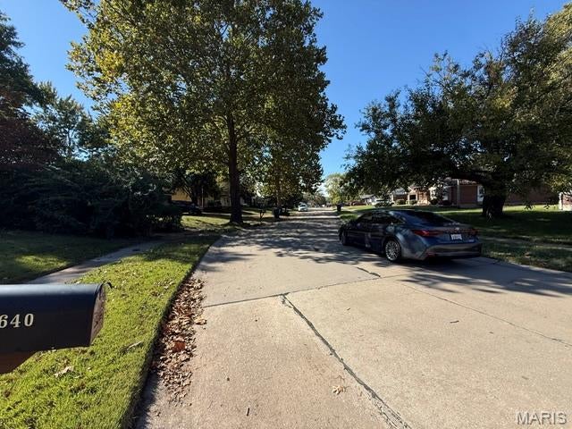Photo of 2640 Woodsage Drive, Florissant, MO 63033 (MLS # 26067390)