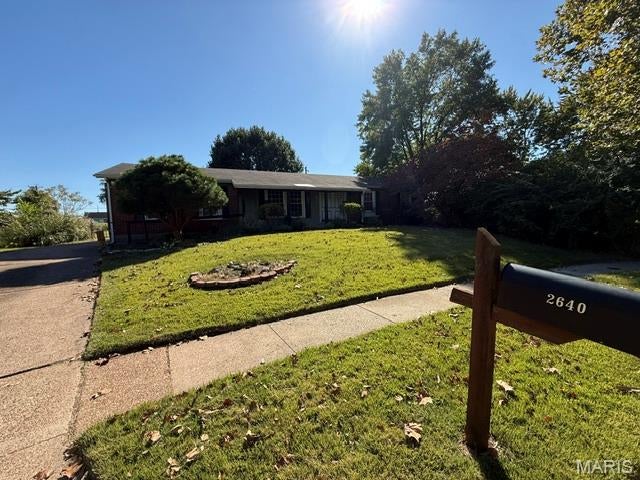 Photo of 2640 Woodsage Drive, Florissant, MO 63033 (MLS # 26067390)