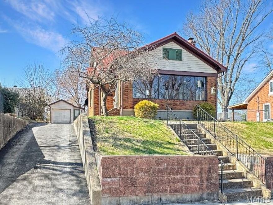 Downtown Living is waiting for you, walk to the riverfront trail, dining, shopping, and festivals. This Charming brick 1 1/2 story has so much charm and character. Glimpse of the Missouri River. 1 car detached oversized garage. Large lot with fenced back yard, to enjoy your evenings. An enclosed front porch to enjoy the river view and watch the ceiling.