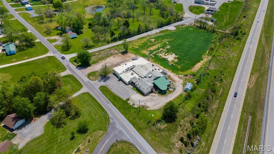 Introducing a prime business opportunity: a 14,104 SF former butcher shop and meat processing facility located in the thriving Jackson, Missouri area.  This property is ideal for users seeking flex, manufacturing, or refrigerated/cold storage space.  With ample square footage and no zoning, this large building provides the perfect canvas for realizing a wide range of business possibilities.  The building sits on 1.72 acres, with 2.55 flat acres below for expansion or other uses.  Great I-55 visibility and frontage! Location: Rural