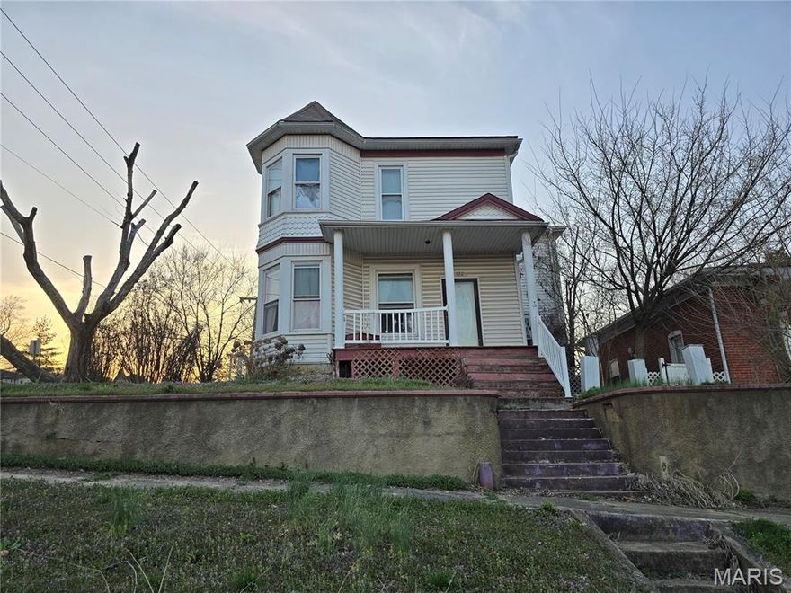 Spacious historic 2-story home full of character and opportunity! With over 2,100 sq ft, this 1920 home offers generous room sizes and a layout ready to be reimagined.
Features include wood floors, tall ceilings, and multiple bay windows that bring in abundant natural light. The main level offers a large living room, dining room, spacious kitchen, and a den/bedroom area, along with main floor laundry and a full bath.
Upstairs includes two true bedrooms and one additional room that could serve as a bedroom, office, or flex space, with access through a bathroom or adjoining bedroom.
Situated on a corner lot with a covered porch, carport, and partial basement for storage.
Property is being sold as-is and will require repairs, but offers incredible potential for renovation, investment, or restoration. A great opportunity to bring this historic home back to life!