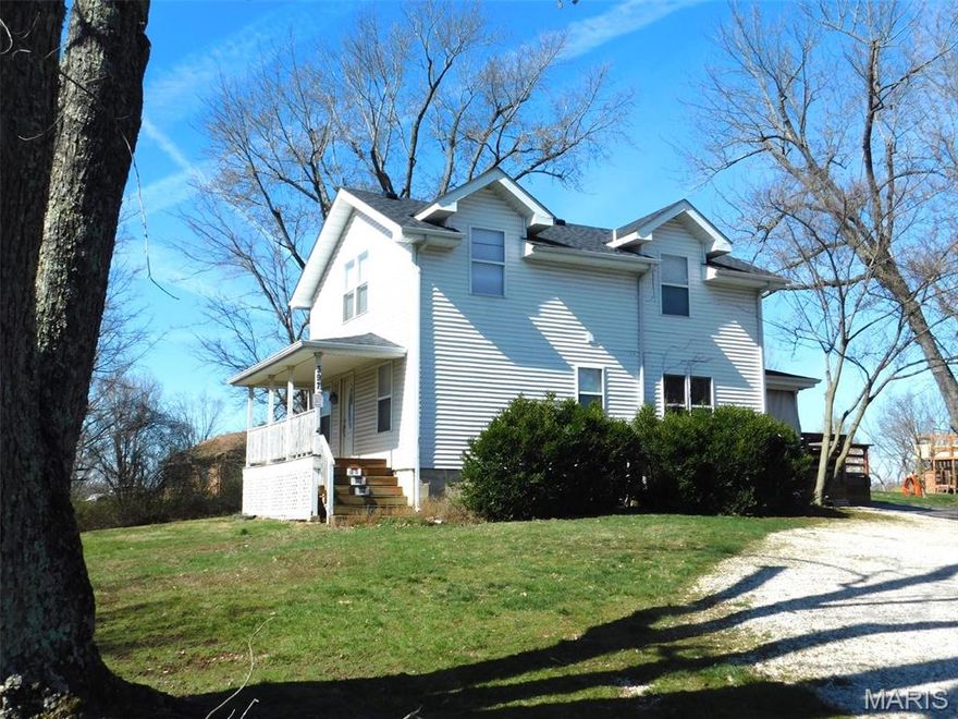 Beautifully remodeled 2 story farmhouse on 2.72 acres, offering the perfect balance of country charm and modern comfort. This spacious home features 4 bedrooms 2 baths and a finished lower level, updated interior finishes, and inviting living spaces designed for today's lifestyle includes a large deck overlooking backyard for all your summer bbq's with family and friends. Detached 1 car garage, and additional out building with finished walls and electric.  Newly built 40x40 3 bay garage with 220 electric, 1 bay designed for an RV, extra space for a workshop, or dream space any hobbyist would love.  Lots of room to grow, this property delivers privacy, functionality, and endless possibilities with convenient highway access.