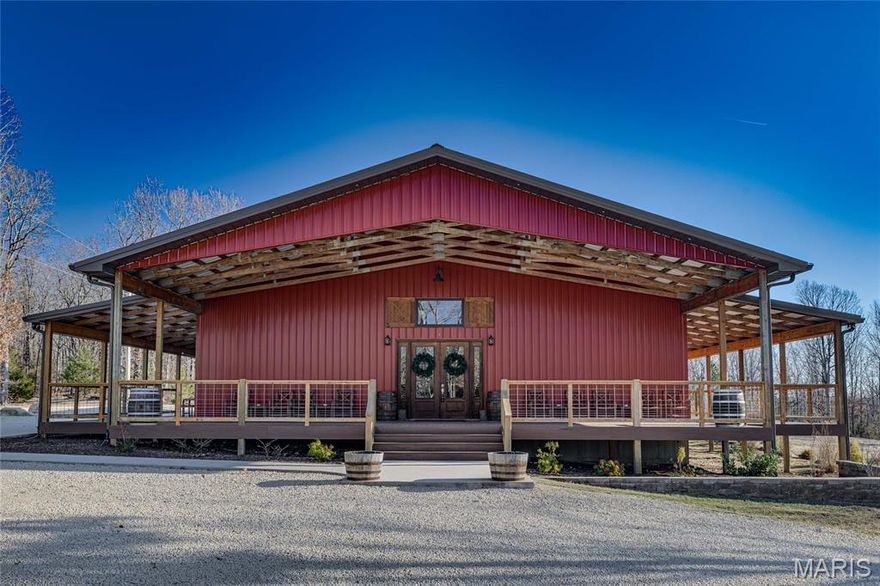 An exceptional opportunity to own a fully established, turnkey wedding and event venue set on 10 private, wooded acres. Known as Wild Coyote Ranch, this newer construction venue was built in 2021 and offers modern systems, updated finishes, and thoughtfully designed spaces throughout, allowing you to step into ownership with confidence and minimal startup work.

The expansive main event hall features soaring ceilings, exposed wood trusses, polished concrete floors, and warm natural finishes that create an unforgettable atmosphere. Overlooking the main event space is a loft that adds dramatic character and flexibility, complete with two dedicated storage rooms. The venue also offers a fully equipped commercial kitchen, two restrooms, two private get-ready rooms, and a dedicated utility/janitorial room designed for smooth event operations.

Outside, guests are welcomed by a beautiful wooded ceremony area with benches already in place, creating a peaceful and private backdrop for events. The building is enhanced by long covered porches along the front and both sides, spanning the full length of the venue and offering generous space for guests to gather, mingle, and enjoy the setting. The property also provides ample on-site parking, easily accommodating large gatherings and event traffic.

This property is being sold 100% turnkey. Everything you see conveys with the sale, including all commercial kitchen equipment, venue tables and chairs, décor and inventory stored on site, furniture in the get-ready rooms, ceremony benches, and more. Starlink internet equipment is also included, providing reliable connectivity in a serene, rural setting.

Whether you’re launching your first venue or expanding an existing event business, this newer, fully equipped property offers a rare opportunity to begin hosting events immediately in a well-known and beautifully maintained setting.