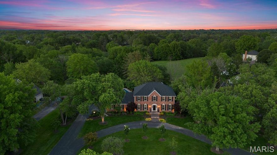 PROPRT SOLD AS IS.  NO REPAIRS OR CONCESSIONS. In the most coveted location of this prestigious community, this custom, STL brick faced executive home radiates timeless elegance and superior craftsmanship. Inspired by the charm of the French countryside and classic English estates, its light-filled interiors blend sophistication with warmth. Designed for both grand entertaining and intimate living, the open floor plan showcases expansive rooms, a welcoming family room, and a chef’s kitchen overlooking a custom pool, manicured gardens, and a serene greenway.  The main-level laundry offers added convenience. The recently renovated primary suite is a spa-like retreat, while three additional bedrooms provide peaceful sanctuaries with a shared elegant bath. The walk-out lower level is a dream space for the sports enthusiast or hobbyist, complete with a full bath and direct greenway access.  A residence designed for fluid transitions between interior and exterior spaces. A rare opportunity to own one of the finest homes in the community.