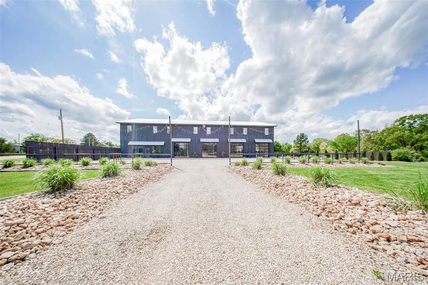 Stunning Turnkey Wedding Venue Just Minutes from Rolla – Approximately 10,000 SQ FT on 3.83 Acres m/l!  Don’t miss this rare opportunity to own a thriving wedding & event venue nestled just outside of Rolla. Set on 3.83 picturesque acres, this beautifully remodeled 10,000 sq ft barn and landscaped grounds blend rustic charm with modern & edgy design elements to create an unforgettable atmosphere for the ultimate wedding experience.  The main level features a bar, kitchen, restrooms, storage, & the main level ceremony/reception hall. Bridal party suites, storage space, & a 2nd large ceremony space are upstairs.  With a capacity to host up to 250 guests, this intimate yet spacious venue is fully equipped for indoor and outdoor ceremonies, receptions, and private events. Its unique aesthetic has earned it a strong reputation and steady bookings – making it a seamless turnkey business opportunity. New ownership will be required to honor all events currently booked at the time of sale. Location: Rural