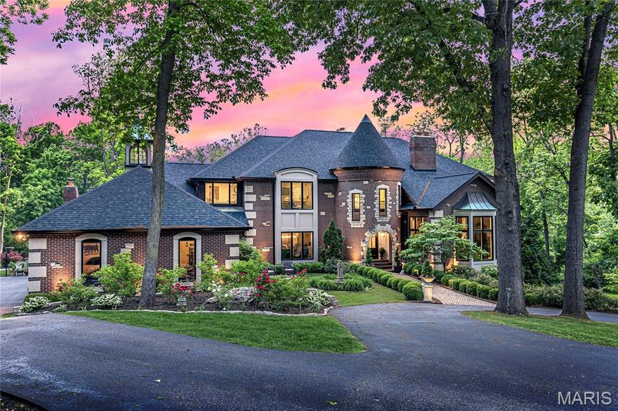 Prominently situated at the end of the cul-de-sac, this 10,387 sf estate home makes a stunning entrance. Dramatic 2-sty foyer leads to coffered study with marble fireplace, elegant dining room, library-paneled family room with wet bar & vaulted great room with full-height fireplace & soaring windows overlooking parklike grounds. Designer kitchen with custom cabinetry, quartzite counters, commercial grade appliances & 9’ center island adjoins breakfast room with wide bay window & hearth room with tiled fireplace. Primary suite with heated floors & marble bath offers an appealing retreat. Front & rear staircases access 6 additional bedrooms, 1 ensuite & 2 with Jack n’ Jill bath, bonus room & hall full bath. Lower Level includes recreation room, family room & media room with see-through fireplace & game room plus workout room & full bath. Situated on a wooded 3.5-ac lot with deck, patio with firepit, pavilion with grilling station & resort style pool surrounded by landscaped gardens.