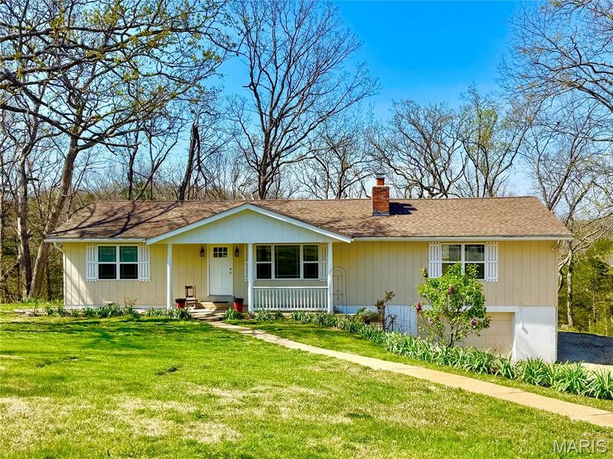 Discover peaceful country living with this 3-bedroom ranch home, sitting on 10.52 private acres (MOL). With an inviting open floor plan and several updates throughout, this property is ready for its next chapter. The home is spacious, ideal for everyday living and entertaining, with newer appliances, updated electric for peace of mind, efficient heat pump and newer furnace, newer water heater, cozy wood-burning fireplace for those crisp Missouri evenings, and so much more. The Primary Suite is 628 sqft, and offers a half bath. There is a heated and cooled tuck under garage for even more storage! The walk out basement is unfinished, offering so many opportunities. A standout feature of this property is the impressive 30 x 50 shop, fully equipped and ready for work or play: 200-amp electric service, concrete floors, ceiling fans, two overhead doors plus one man door. Don't miss the 30-amp RV hookup—perfect for guests, travel prep, or extra power needs. With 10.5 acres, you’ll have room to roam, garden, hunt, raise animals, or simply enjoy the quiet beauty of the countryside. It’s the kind of property that offers freedom, privacy, and endless possibilities.