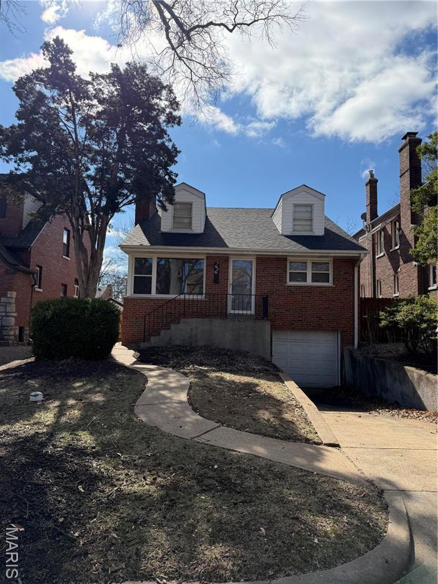 Cute 2 bedroom 1.5 bath, stylish contemporary home in University City with lots of light!  OPEN floor plan with a modern, fully updated Euro-style kitchen with high vaulted ceilings and a breakfast bar. Unique professionally finished movie set style lower level with 1 car garage. This home is just a few blocks from Clayton and I-170.  Rec/game room in LL is 22x15. Adorable house and fantastic yard! Pet negotiable.