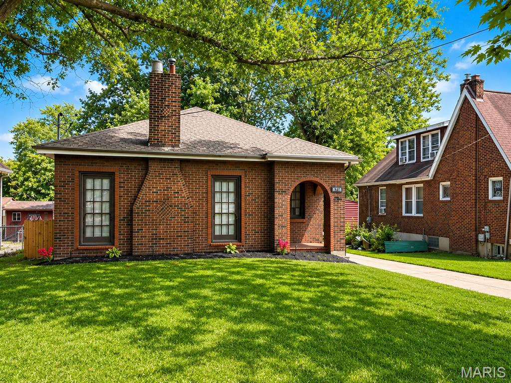 Photo of 8718 Clifton Avenue, Jennings, MO 63136 (MLS # 26036911)