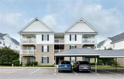 Photo of 7101 Spring Creek Lane, OFallon, MO 63368 (MLS # 26048748)