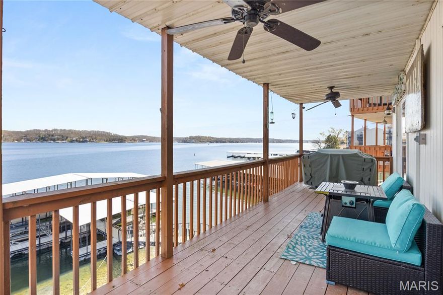 Experience the ultimate Lake of the Ozarks lifestyle at Tara Condominiums! Nestled at the 3MM in Lake Ozark, this quaint, character-filled complex offers some of the most breathtaking, miles-long views on the water. This newly updated 1-bedroom, 1-bathroom condo comes fully furnished and turnkey—just bring your bags and start relaxing. Inside, discover a "rustic meets lake" vibe featuring an open floor plan, sleek granite countertops, crown molding, and high-quality finishes throughout. The spacious bedroom includes a walk-in closet, and the covered lakeside deck is perfect for soaking in those endless views. For the savvy buyer, this unit offers incredible versatility as a high-potential nightly rental or an affordable private getaway. Boaters, take note: This unit includes one of only TWO of the largest slips in the community dock! The 12x28 slip features a raised roof to accommodate a larger cruiser and comes equipped with an 8,000-lb boat hoist. Located minutes from premier shopping, dining, and world-class entertainment, this is the lake retreat you’ve been waiting for. Schedule your private tour today and make the smarter move to the lake!