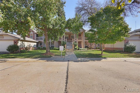 Photo of 5356 N Kenrick Parke Drive, St Louis, MO 63119 (MLS # 26067778)