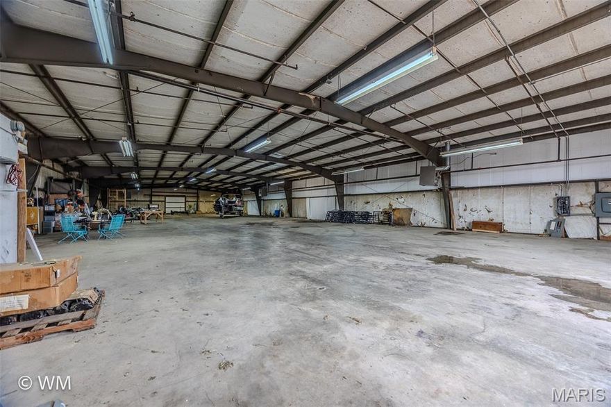 Exceptional opportunity to acquire a 10,000 square foot warehouse positioned on W Main Street in Richland, Missouri. Strategically located with convenient access to Highway 133 and within minutes of major regional routes, this property offers outstanding visibility and accessibility for a variety of commercial or industrial uses.

The expansive interior provides flexible open warehouse space suitable for storage, distribution, light manufacturing, contractor operations, agricultural supply, or investment purposes. Generous square footage allows for equipment storage, fleet parking, material handling, or build-out potential to suit business needs.

Situated on 5.30+/- acres, this property presents an excellent opportunity for owner-operators seeking functional space or investors looking to expand their commercial portfolio in a growing South Central Missouri market. Richland’s central location between Lebanon, Waynesville, and Lake of the Ozarks enhances regional accessibility.

Whether you are expanding operations, relocating, or securing warehouse space with long-term potential, this property delivers size, location, and versatility.