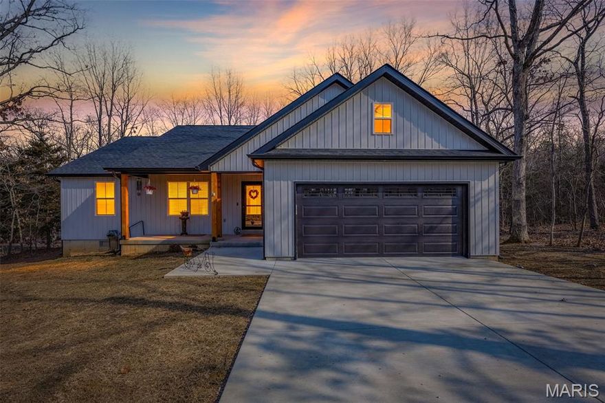 Beautiful 3 bed, 2 bath home tucked away on a private road, 1 mile from the two largest lakes at Terre Du Lac. This well-designed home features stunning tray and vaulted ceiling details that create an open, airy feel throughout. The spacious kitchen offers abundant cabinet space, with a cabinet that holds your trash can, and plenty of room for cooking and gathering. Extra features include locking storm doors, mini blinds inside the glass at the back door, 4” custom blinds on the front window.  This home has a full water softener system. Enjoy the perfect blend of privacy and lake-community living in this inviting home.