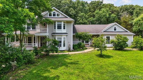 Photo of 1519 Scofield Valley Lane, Wildwood, MO 63038 (MLS # 25077770)