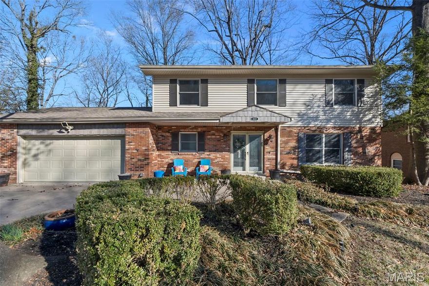 Nestled in the established Woodland Hills Estate neighborhood, this spacious two-story home offers over 2000 square feet with 4 bedrooms and 2.5 bathrooms. The main level features a half bath, large living room with new LVP flooring and separate formal dining, while the kitchen provides plenty of space and opens to additional living space or an eat in area. Upstairs, you will find four generously sized bedrooms, including an updated hall bath and a full primary suite with remodeled bath and walk in closet. The walkout basement offers plenty of storage or options to add more finished living area with an egress window and roughed in plumbing ready for a bathroom. Situated on a nearly quarter-acre lot, the backyard provides plenty of space to relax or gather outdoors. Many updates throughout including new LVP flooring, new carpet, new baseboards, and remodeled bathrooms. Move-in ready and waiting for you to call it home!