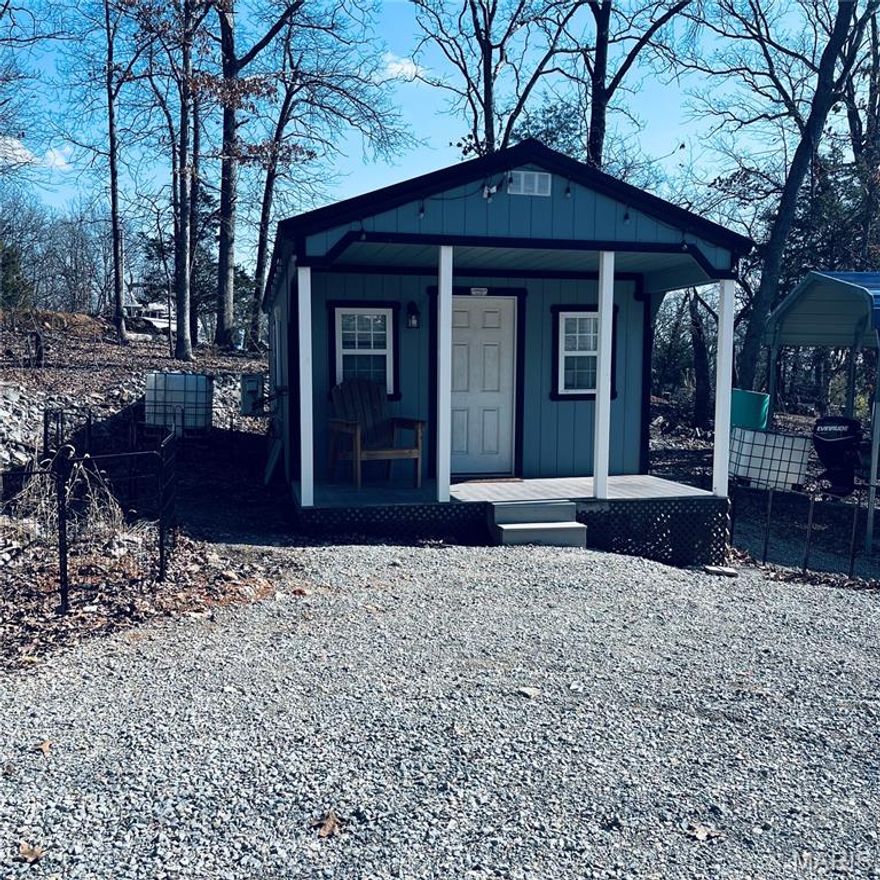 Charming 2-Bedroom Cabin with Modern Utilities & Fully Furnished, located on two lots in Goose Creek Lake subdivision. 

This well-maintained 2-bedroom, 1-bath cabin offers comfort, functionality, and flexibility in a peaceful setting. The home features an instant hot water system and a mini-split unit providing efficient heating and air conditioning, supported by a 200-amp electrical service.

Inside, the cabin comes fully furnished, including a king mattress and bedroom set, bunk beds, and a pullout couch. All furniture, extra A/C linens, and appliances are included, making this a true turn-key property.  The property is equipped with a 40-gallon black holding tank, plus an additional 100-gallon portable holding tank. Please note: the plat is DNR-restricted—no septic system or in-ground holding tank is permitted. A well may be installed with proper permits.

Outdoor features include a pet fence, an outdoor grill, and a spacious 20’ x 30’ x 16’ carport for vehicles, equipment, or storage. The property has been professionally surveyed.

 The main lake spans approximately 400 acres and offers a wide variety of recreational opportunities, including boating, fishing, skiing, swimming, and other water sports. Several smaller lakes throughout the community are available for fishing and non-motorized boating.  Residents enjoy an impressive array of amenities, including two playgrounds, a private park area, 24-hour security, a newer swimming pool, a sandy beach, and two boat launches. Goose Creek is more than just a subdivision—it’s a true community. With numerous organized social events throughout the year, there’s always something to do, or you can simply relax and enjoy the peaceful surroundings.




An excellent opportunity for a recreational retreat or getaway property with modern conveniences already in place.