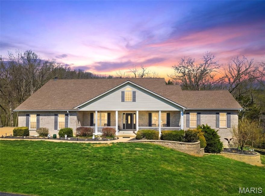 Tucked away in a private enclave of just ten homes, this exceptional 4 bedroom, 3 bath ranch offers more than 4,500 square feet of thoughtfully designed living space.  A charming covered front porch opens to a welcoming foyer and an expansive floor plan featuring soaring ceilings and abundant natural light. The spacious great room, with raised-hearth fireplace, flows seamlessly into a sunroom with endless views of the serene, 3-acre backyard. The chef of the house will delight in the well-appointed kitchen showcasing granite countertops, custom cabinetry, stainless steel appliances, gas cooktop, tile flooring, and a large breakfast bar with a built-in beverage cooler.  A divided bedroom floor plan provides added privacy, while the primary suite offers a true retreat with a spa-like bath including dual vanities, separate shower, corner jet tub, and two walk-in closets. Two additional bedrooms, a full bath, office, and laundry room complete the main level. The finished walkout lower level offers a large recreation area with wet bar, a theater or game room, and convenient access to a third full bath. Perfect for guests, the spacious fourth bedroom includes a walk-in closet and added soundproof insulation. Step outside to a covered paver patio overlooking the wooded, private backyard and your very own 18-foot swim spa that provides a year-round haven for fitness, relaxation, and hydrotherapy. Whether swimming against the current for a low-impact workout or simply unwinding under the stars, this incredible feature offers a resort-like experience right in your own backyard.  Designed for the ultimate car enthusiast, collector, or hobbyist, don’t miss the detached, climate controlled, 7-car garage complete with a professional-grade lift, expansive workshop space and ample room for maintenance, restoration projects, or storing your various recreational vehicles. Truly a standout feature that sets this property in a class of its own! Additional highlights include: 3-car side entry garage, zoned HVAC, newer water softener, whole-house water filtration system, and a fantastic list of included items: pool table, swim spa, kitchen and LL refrigerators, breakfast bar beverage cooler, washer and dryer all stay!