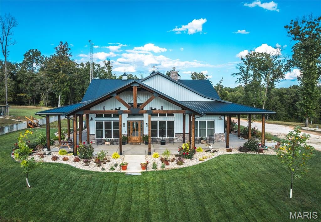 Photo of 476 S Davis Hollow Rd-Tract C RD, Richland, MO 65556 (MLS # 26042908)