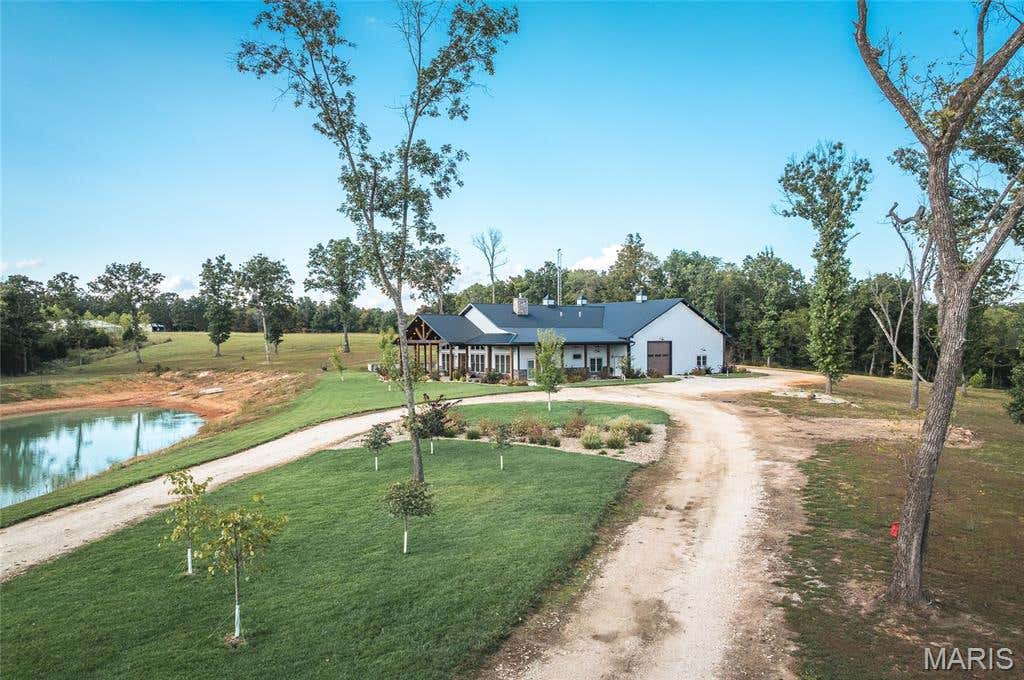 Photo of 476 S Davis Hollow Rd-Tract C RD, Richland, MO 65556 (MLS # 26042908)