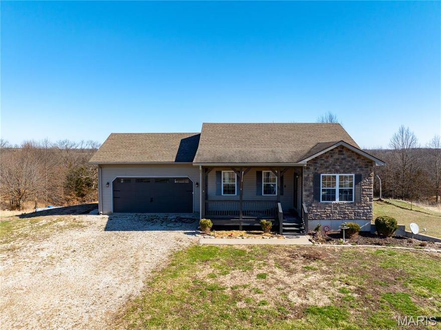 Looking to start your homestead? This property is the perfect place to begin! Nestled privately just off Highway 6, this 3-bedroom, 2-bath home sits beautifully on 40 acres m/l of scenic countryside. The primary suite is conveniently located on the main level, while the fully finished lower level features two additional bedrooms, a full bathroom, laundry area, and a walk-out to the spacious backyard. The land is already well-prepared for livestock and hobby farming, with 6 acres fenced for horses or goats and 10 acres fenced for cattle. Outbuildings include a 50x30 utility barn with a 12x50 lean-to and a 40x32 barn currently used for hay storage, offering plenty of space for equipment, animals, or additional storage. The current owner has thoughtfully started a thriving homestead with asparagus, strawberries, raspberries, apple trees, and multiple perennial flowers already planted and established. Enjoy peaceful country living while still being conveniently located just 30 minutes from Quincy, Illinois. Schedule your showing today!