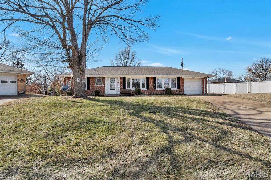 Absolutely darling turn key ranch tucked away on a quiet cul-de-sac in Affton, all set on a large, level fenced-in lot! This meticulously maintained home is bursting with curb appeal, featuring beautifully manicured landscaping and a gorgeous brick exterior. Step inside to a welcoming entry that opens to a spacious living room, separate dining room, and a beautiful kitchen—perfect for everyday living and entertaining. The main level offers three generously sized bedrooms and a fantastically updated, stylish full bath. The partially finished lower level expands your living space with an additional full bathroom, bonus living area, and ample storage. An attached one-car garage provides covered parking, with additional off-street parking available. Enjoy a private, secluded setting while still being just minutes from shopping, dining, and major highways. This home truly has it all—charming, functional, and simply darling!