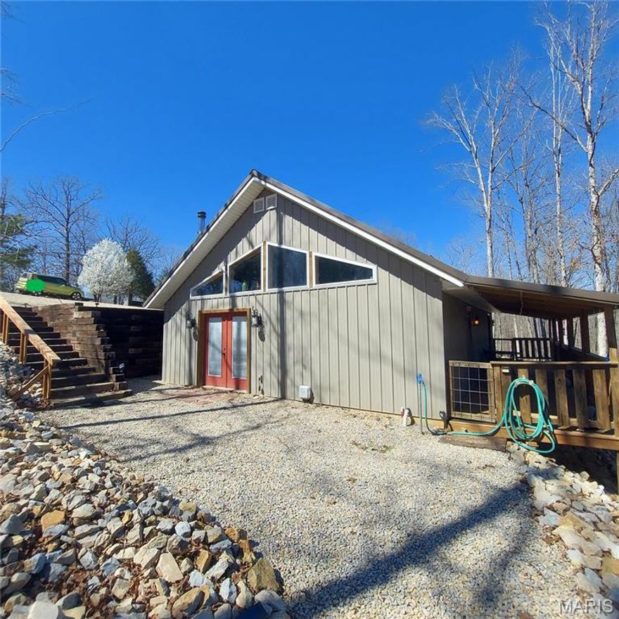 Welcome to 1432 Wayne 523, where woodsy meets wonderful in beautiful Wappapello! This unique home was built in 2016 with continuous upgrades performed over the years. You are sure to enjoy cooking and hanging out in the adorable kitchen that boasts newer Stainless-Steel appliances, a breakfast bar & is open to the living & dining areas. Main floor laundry room makes the chore a breeze, Washer & Dryer included! Homes vaulted ceilings & high celestial windows create gorgeous space & adds natural light. 2 nice size bedrooms (1 with & 1 without a closet) and loft above 2nd bedroom can be used as an office, sleeping space or storage. An A-Frame home with kitchenette, 1 bed & bathroom & porch (separate electric access) is also on the property as well as a woodshed, additional building & garage. Sellers have leveled & rocked the front for easy parking and access to home & bldgs. Backyard Pond has fish! Close to Wappapello Lake, marina's, water access, hunting, restaurants, parks and camp grounds! TURN KEY OPPORTUNITY! BEING SOLD AS FURNISHED, PLUS SO MUCH MORE!