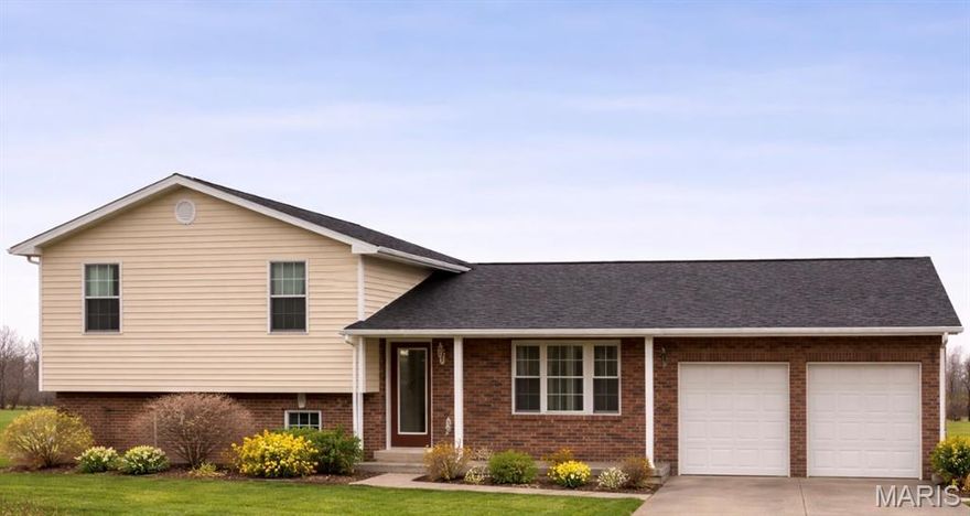 Located just outside Fredericktown city limits, this well-maintained and beautifully updated 3-bedroom, 2-bath tri-level home offers approximately 2,456 square feet of living space on 1.4 acres. The main level features engineered hardwood flooring and a kitchen with granite countertops, marble flooring, and all appliances included. French doors open to a spacious 10’ x 30’ deck, ideal for outdoor entertaining. The upper level includes three generously sized bedrooms, including a primary suite with walk-in closet and private bath with tile shower, plus a second full bath with an oversized Jacuzzi tub. The lower level provides a large family room with tile flooring, a possible fourth bedroom or home office, and a laundry/utility room with walkout access. Outdoor amenities include a patio with fire pit, children’s play area, and a 27-foot above-ground pool with new deck. Roof replaced in 2024. Convenient location with a country feel just minutes from town.  This home has a 1 year seller home warranty provided by America's Preferred Home Warranty.