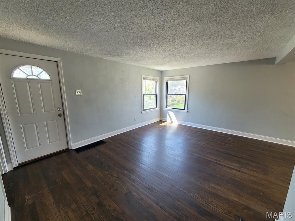 Photo of 8687 Belhaven Drive, St John, MO 63114 (MLS # 26031826)