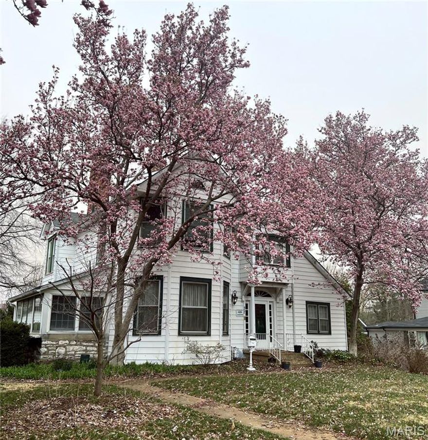 Historic Webster Century home offering 2.5 stories of living space on nearly 3/4 of an acre. Home is very spacious with tall ceilings. The great room features a bay window, gas fireplace with marble surround, crown molding, and natural hardwood floors. Updated kitchen appliances. Enjoy a spa-like bath with a whirlpool tub and heated marble floors. A cheerful 17x7 sunroom overlooks the beautifully landscaped yard and in-ground Baker pool. Additional features include a climate-controlled wine cellar, zoned heating and cooling, and an oversized 2-car detached garage. Beautifully landscaped. One of the first homes built in the subdivision.