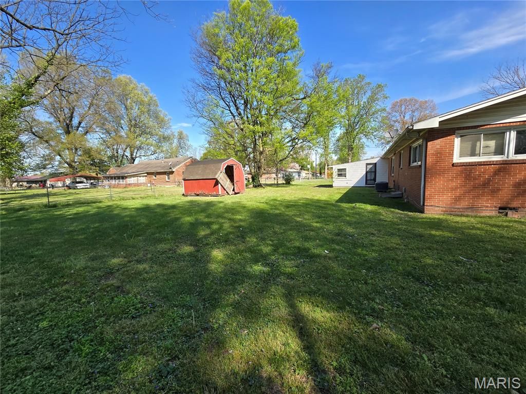 Photo of 601 Carroll Street, Sikeston, MO 63801 (MLS # 26020492)