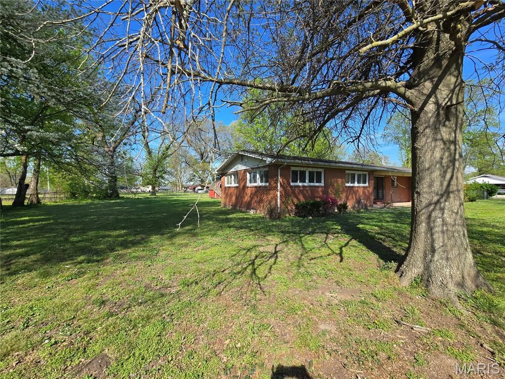 Photo of 601 Carroll Street, Sikeston, MO 63801 (MLS # 26020492)