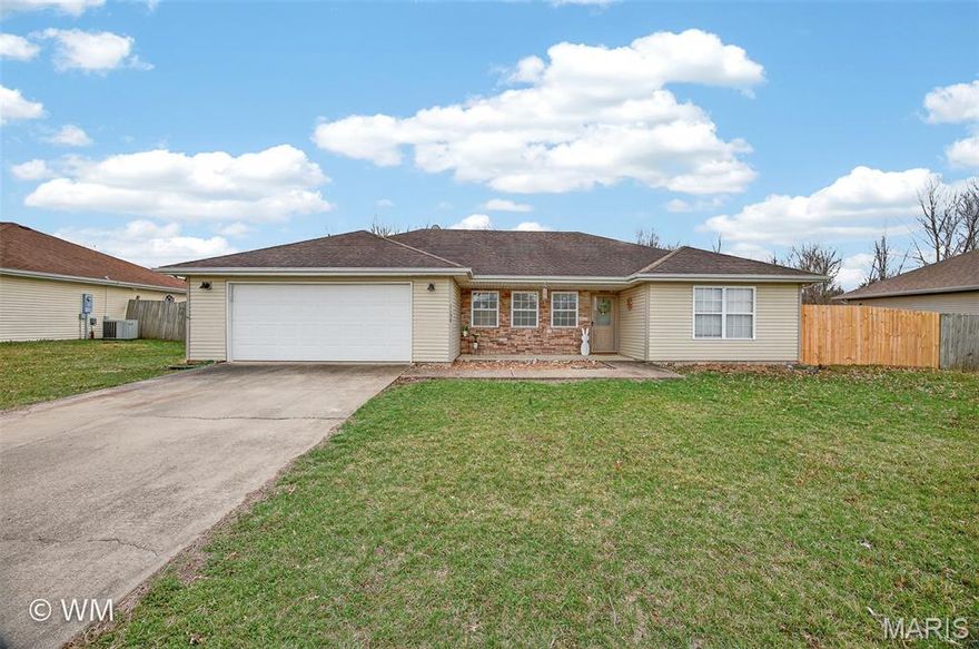 THIS HOME OFFERS A GREAT OPPORTUNITY! The home is selling "As is." Offers about 1,430+ sq ft of living space, a split floor plan, vaulted high ceilings in the living room, an open floor plan, a kitchen with an island, and plenty of cabinetry. The main bedroom features a his-and-hers walk-in closet and a great retreat walk-in bathroom. The backyard has a patio, a storm shelter, and a newer, privacy-fenced yard. Selling "As Is." The house needs some work, but has great potential!