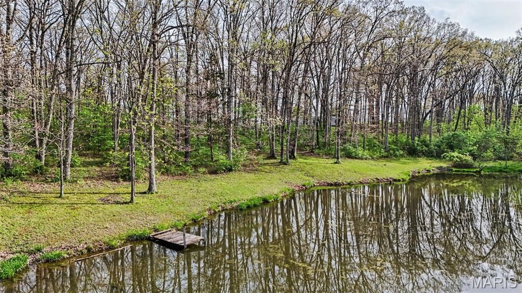 Photo of 24249 Township Line Road, Warrenton, MO 63383 (MLS # 26023452)