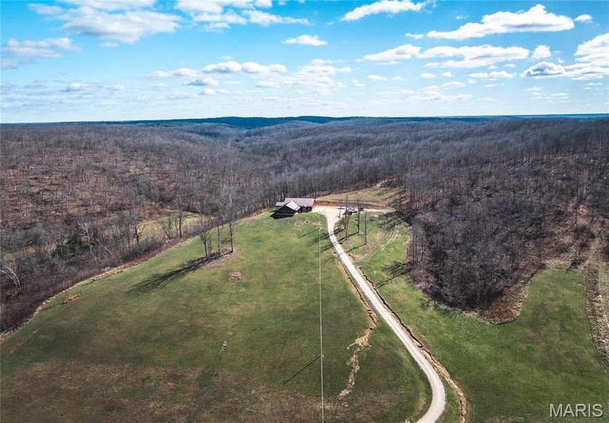 Escape to the Ozarks with this stunning farm in Crawford County, Missouri, offering the perfect blend of comfort, scenery, and outdoor recreation. Perched atop a hill, the 2,200 sq ft home boasts views that truly capture the beauty of the surrounding countryside.
The land features a desirable mix of open pasture and hardwood timber, making it ideal for farming, recreation, or a private retreat. Crooked Creek winds its way through the middle of the property, adding both year-round water and incredible natural character.
This property is a haven for wildlife, with abundant deer and turkey, making it a great hunting property for all seasons and desired species. It also has open area ready for foodplots. Located just 15 minutes from Steelville, 5 minutes from Crooked Creek Conservation Area, and only minutes from the Meramec River, you’ll have quick access to some of the best floating, fishing, and outdoor recreation Missouri has to offer. Owner has added Generac power generators to the home as well. Call today to view this amazing property.