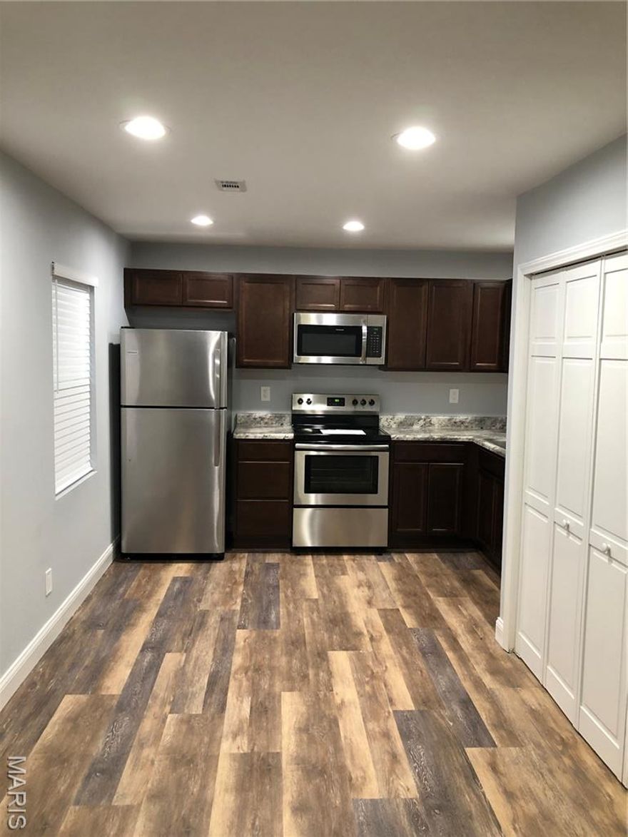 Completely renovated 2bed, 1 bath apartment available to rent, only 1 mile from Gravois Bluffs with close proximity to major interstates and downtown St. Louis.

Apartment is complete with new high end fixtures and window treatments, new flooring throughout, individual washer and dryer, recessed lighting, gourmet kitchen with stainless steel appliances, garbage disposal, new counters, over-sized dual sink, custom cabinetry with soft close hinges and drawers, ceiling fans in all rooms, new water heater, and equipped with new air conditioner and furnace.  Luxury bathroom has been completely redone with granite countertop, tub/shower combo, tile galore, and all new fixtures.  Apartment has new insulation, and is completely water and energy efficient. Custom built-in shelving in all closets to ensure maximum space for clothing and storage. 

Building is professionally owned and managed, and is equipped with 24/7 security via 4K video monitoring to ensure safety.  All units have been hardwired for blazing fast ethernet and cable access.  Water, sewer, trash removal, and 2 assigned parking spaces are included in monthly rent.  Unit is fully electric, with electricity to be paid by tenant.

Rent is $950/month, with an $950 security deposit to be paid at time of lease signing.  Terms of lease are 1 year. Small pets may be approved at management's discretion.  Approved pets require $50/month recurring fee and a $250 non-refundable pet security deposit.  A $50 non-refundable application fee is required.