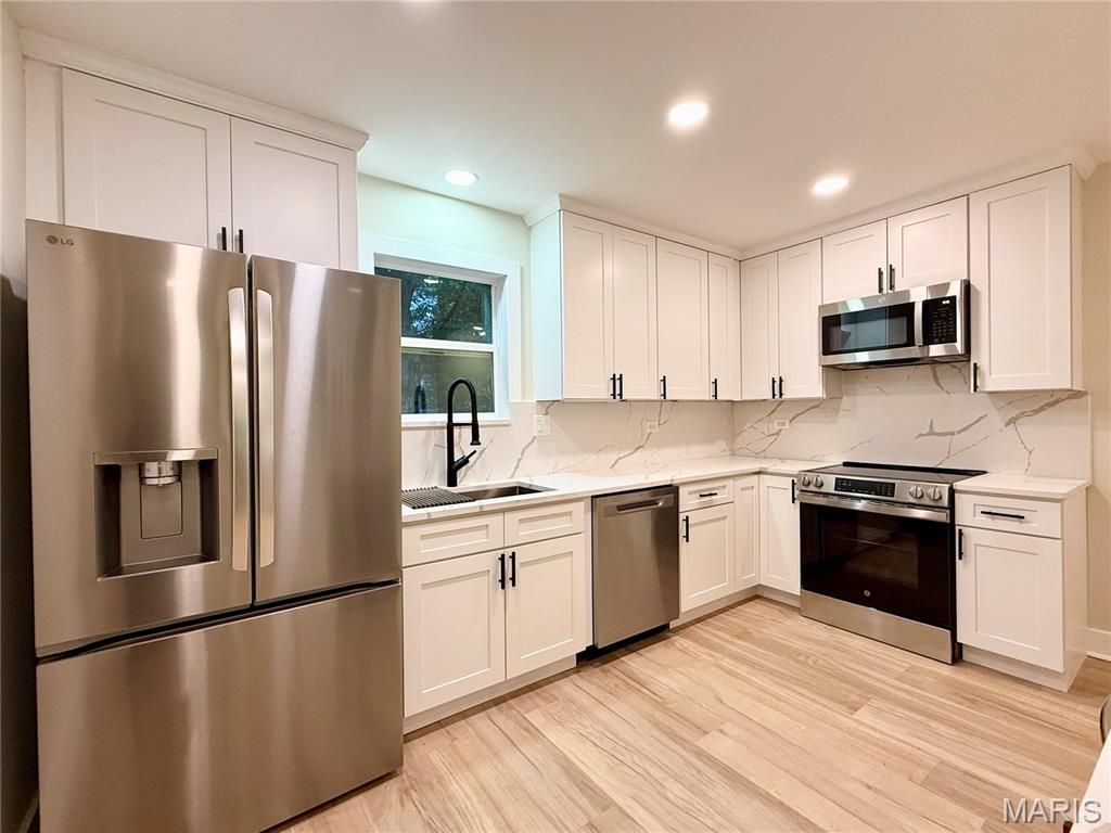 Photo of 2517 Bremerton Road, Rock Hill, MO 63144 (MLS # 25072721)